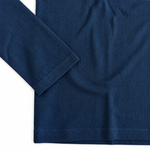 Détail de la manche et du tissu waffle du maillot JT Racing Classic blue